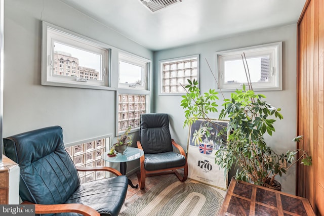 sitting room featuring tile patterned floors