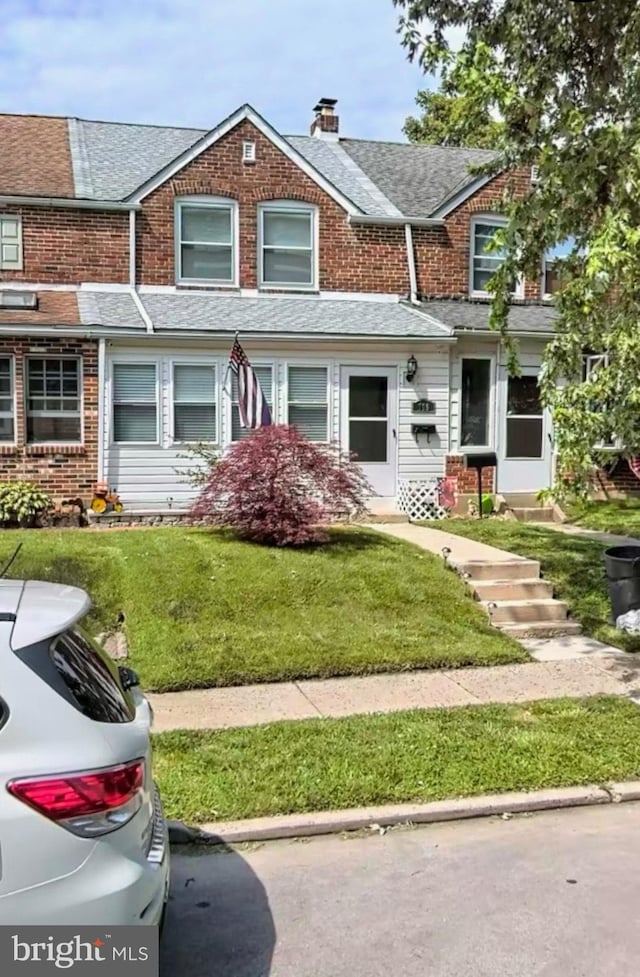 view of property with a front yard