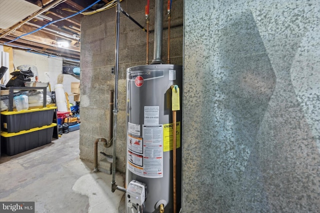 utility room featuring gas water heater