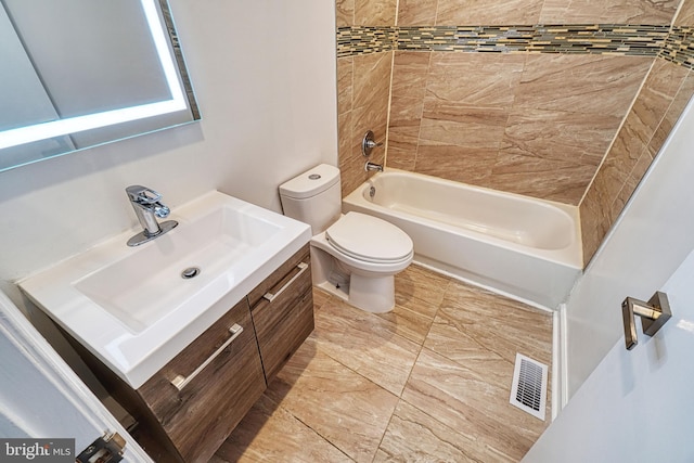 full bathroom with vanity,  shower combination, and toilet