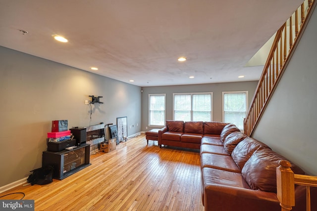 863 Barnaby St SE, Washington, DC 20032 - living room with recessed lighting, hardwood / wood-style flooring, and stairway