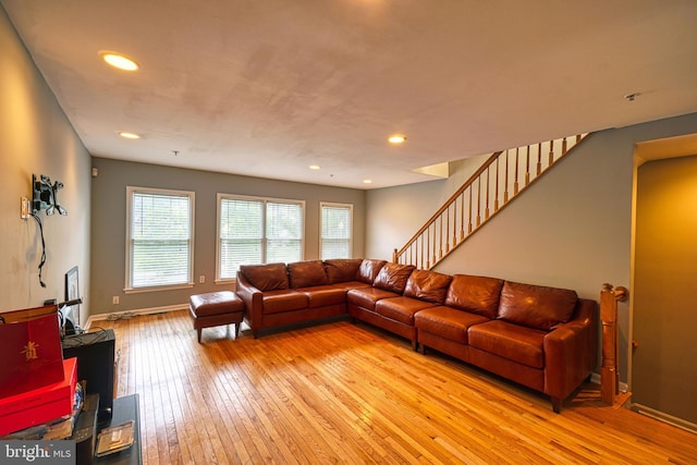 863 Barnaby St SE, Washington, DC 20032 - living area with light wood finished floors, stairs, and recessed lighting