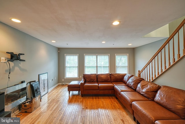 living room with light hardwood / wood-style floors