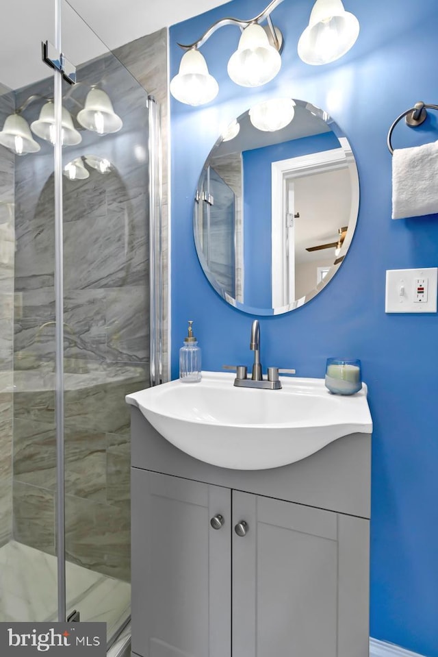 bathroom with vanity and an enclosed shower