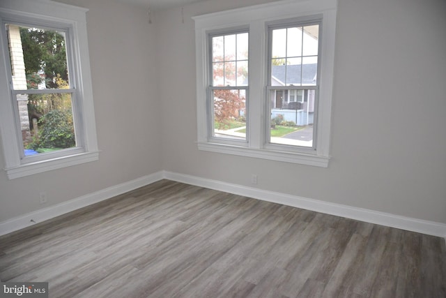 empty room featuring hardwood / wood-style floors