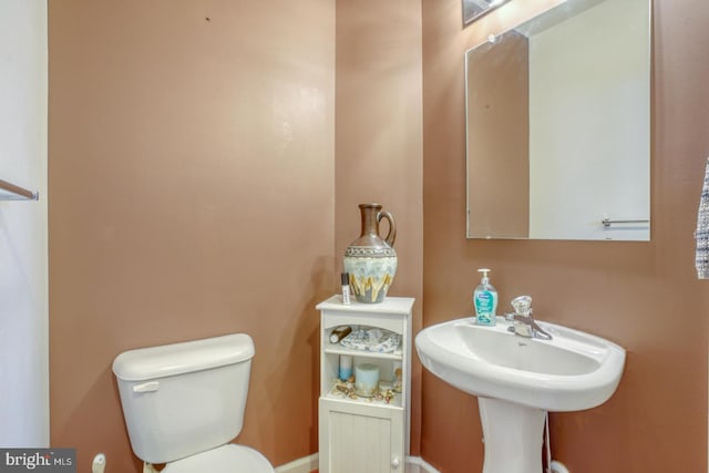 bathroom featuring toilet