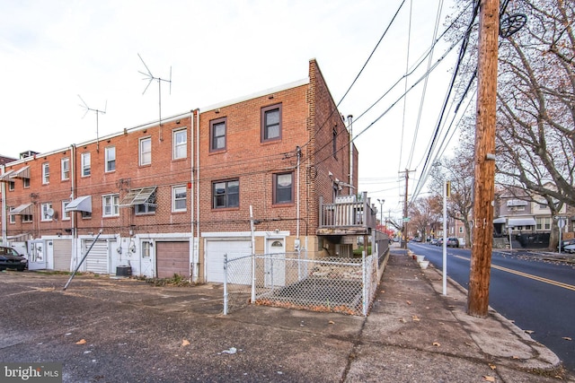 view of property with central AC unit