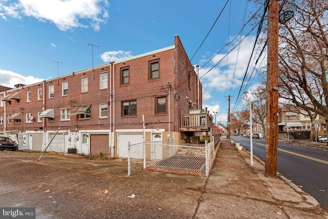 view of property featuring central AC unit