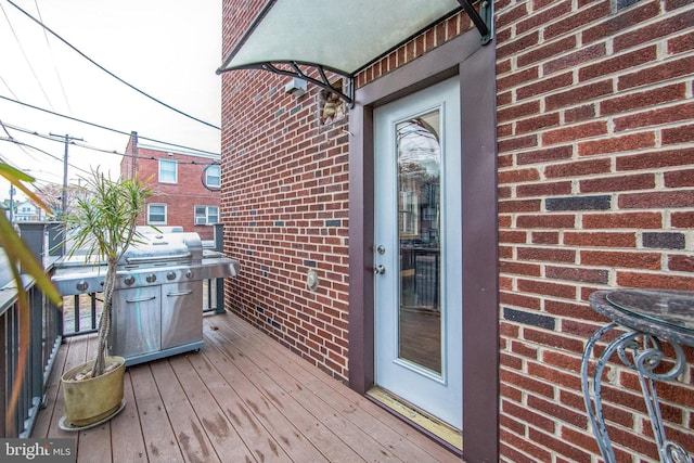 wooden terrace with grilling area