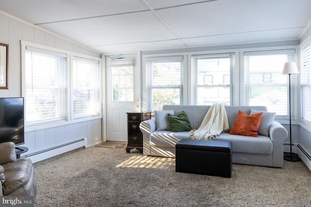 sunroom with baseboard heating and plenty of natural light