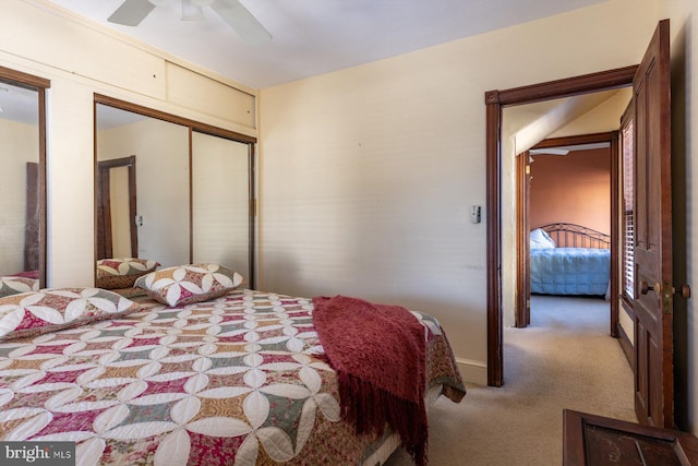 carpeted bedroom featuring ceiling fan