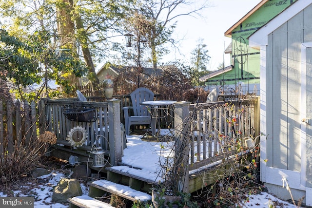 view of snow covered deck