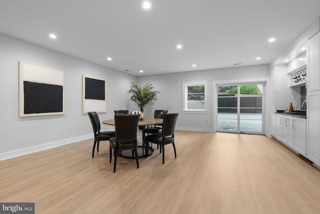 dining space featuring light hardwood / wood-style flooring