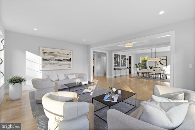 living room with light hardwood / wood-style floors