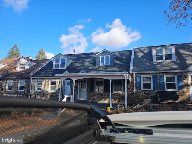 view of new england style home