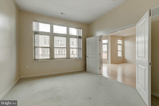 view of carpeted spare room