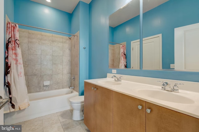 full bathroom featuring tile patterned flooring, vanity, shower / bath combo, and toilet