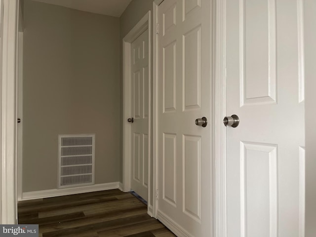 hallway featuring dark hardwood / wood-style floors