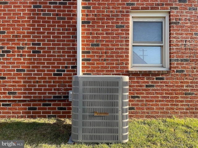 exterior details featuring cooling unit