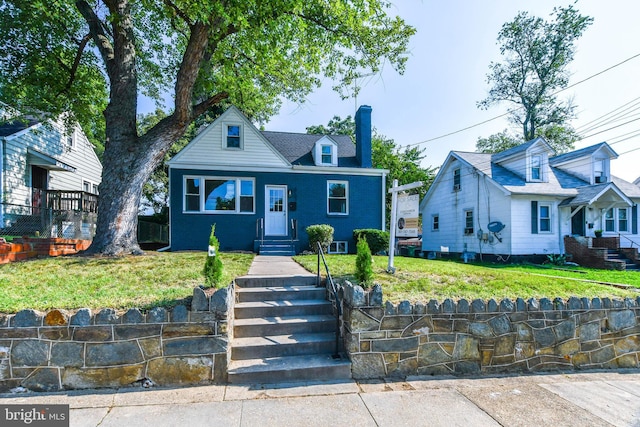 view of front facade with a front lawn