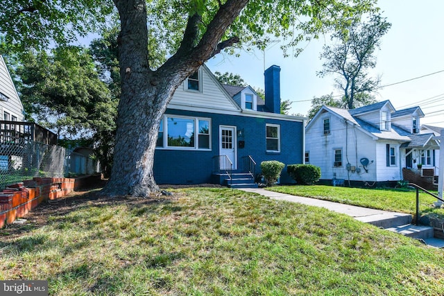 view of front of property featuring a front yard