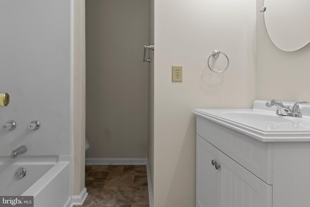 bathroom with vanity and bathing tub / shower combination