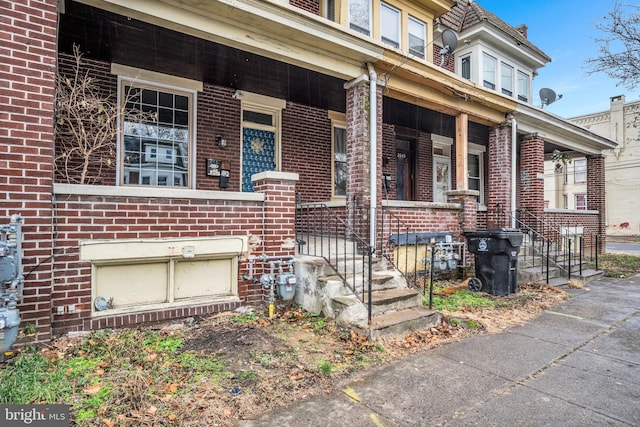 entrance to property with a porch