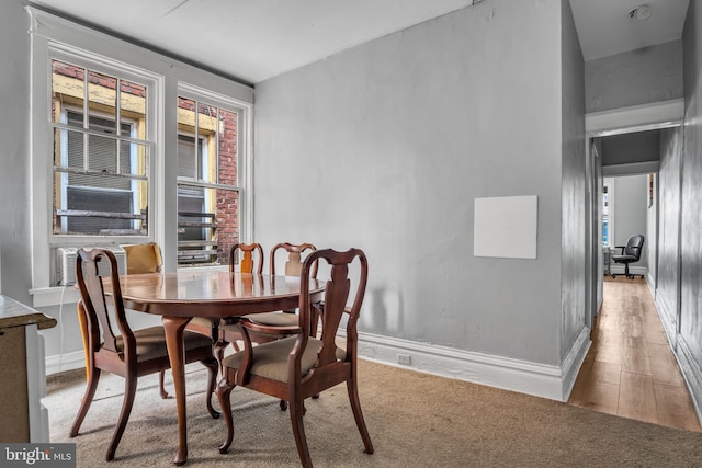 dining area with light wood-type flooring