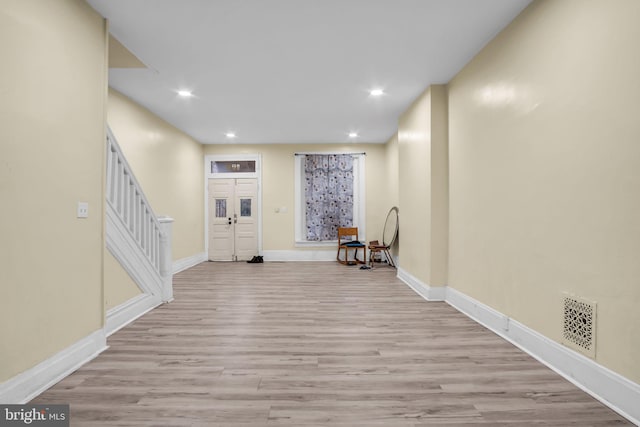 foyer entrance featuring light hardwood / wood-style flooring