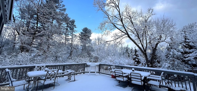 view of snow covered deck