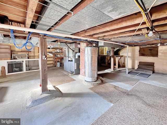 basement with heating unit and water heater