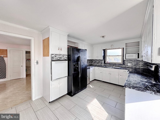 kitchen with white cabinets, white appliances, ornamental molding, and tasteful backsplash