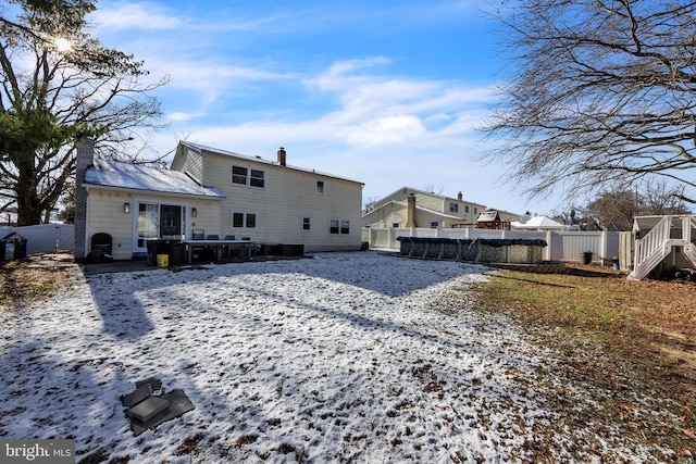 view of snow covered property