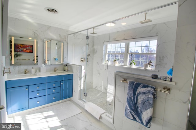 bathroom with vanity, a shower with door, and ornamental molding