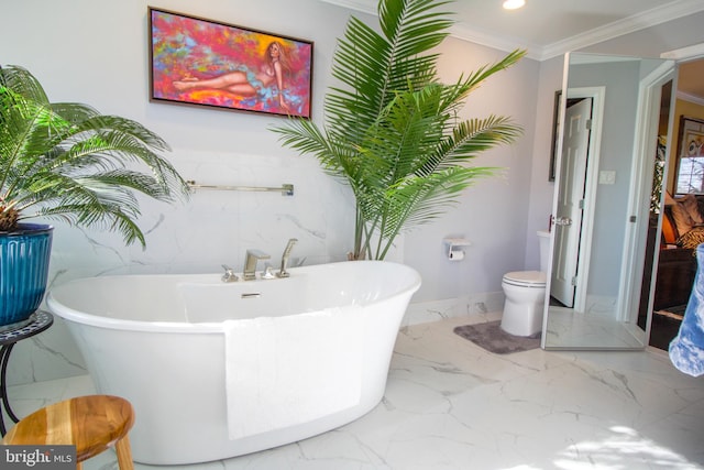 bathroom featuring toilet, a bathtub, and ornamental molding