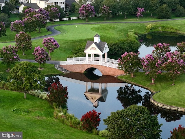 view of home's community featuring a water view