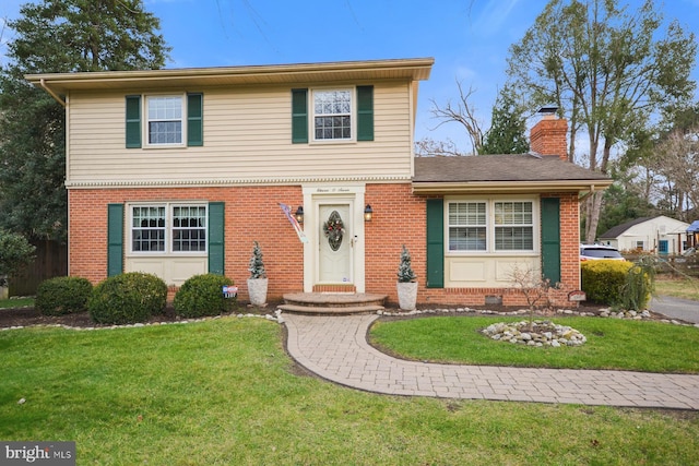 view of front property featuring a front lawn