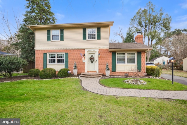 view of front of house with a front lawn