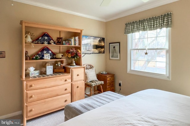 bedroom featuring ornamental molding and light colored carpet