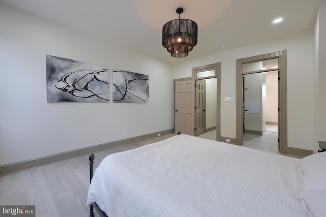 bedroom featuring light wood-type flooring