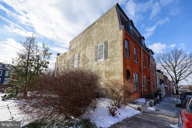 view of snow covered property