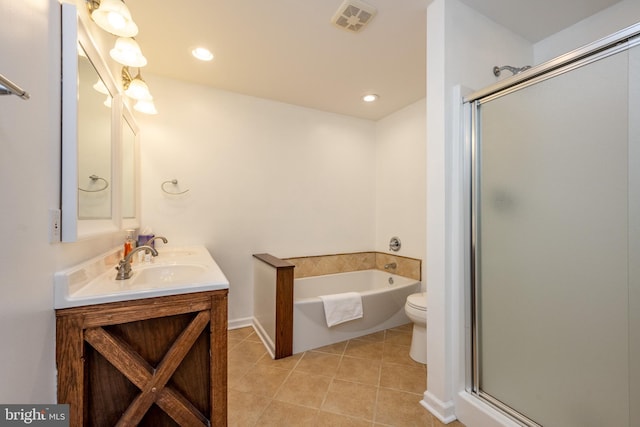 full bathroom with separate shower and tub, tile patterned floors, vanity, and toilet