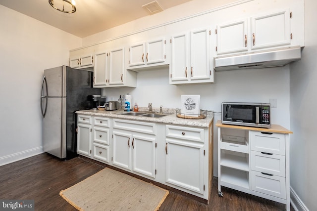 kitchen featuring white cabinets, dark hardwood / wood-style flooring, stainless steel appliances, and sink