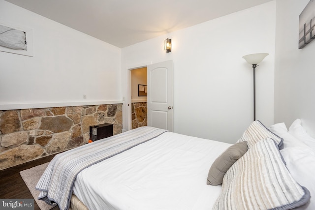 bedroom featuring wood-type flooring