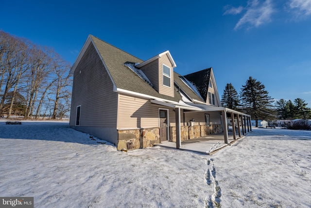 view of snow covered property