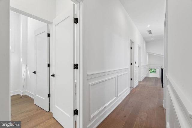 hallway featuring light wood-type flooring