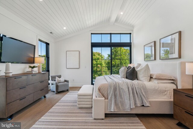 bedroom featuring access to exterior, lofted ceiling with beams, wood ceiling, and light wood-type flooring