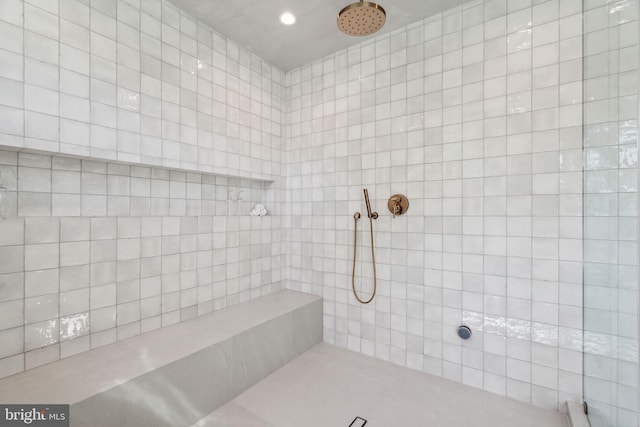 bathroom featuring a shower and tile patterned flooring