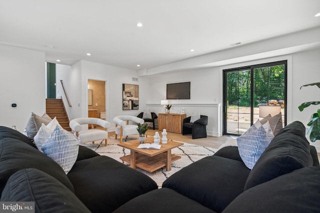 living room with light hardwood / wood-style floors