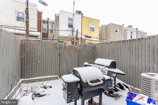 view of snow covered patio